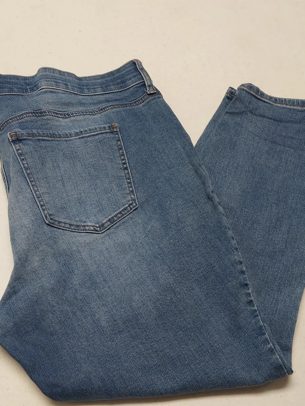Wonderly Mid Rise 16W Skinny Jeans in Light Blue Wash